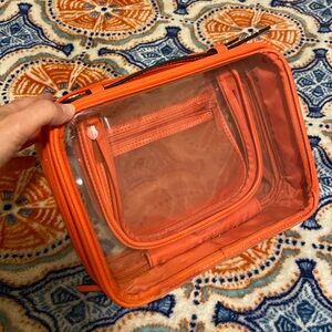 Calpak Orange and Clear Cosmetic Case